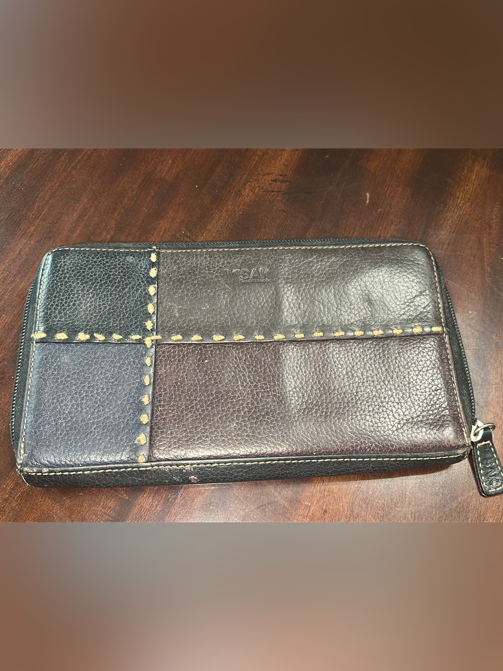 The Sak Patchwork Zip Wallet in Black and Dark Brown (bags 18)